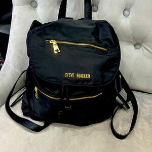 Steve Madden Medium drawstring backpack with exterior compartments